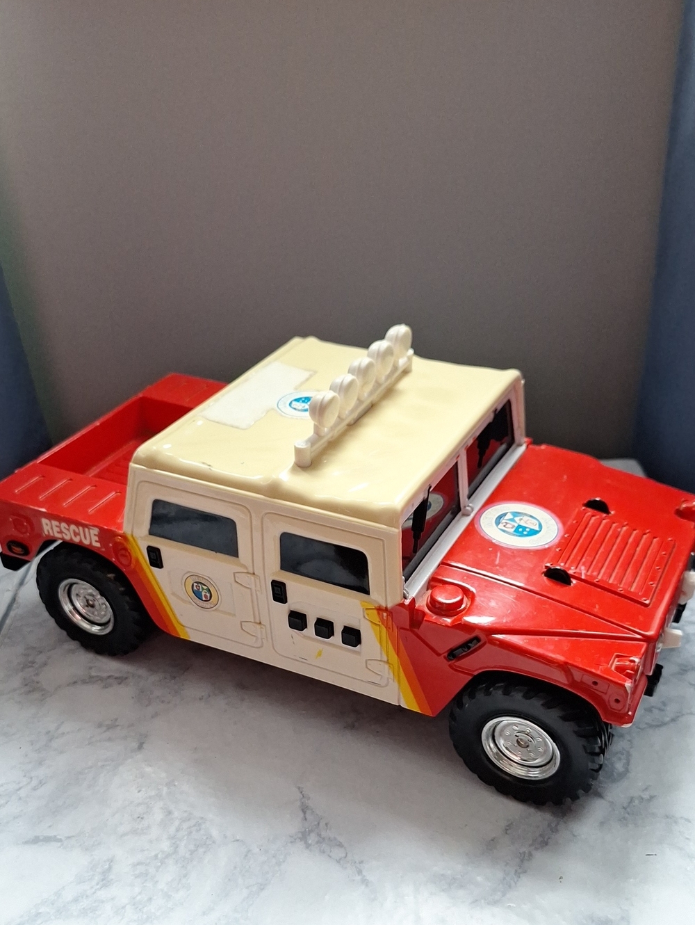 Red and Cream Kids Rescue Truck Toy – Durable Off-Road Play Vehicle 1999